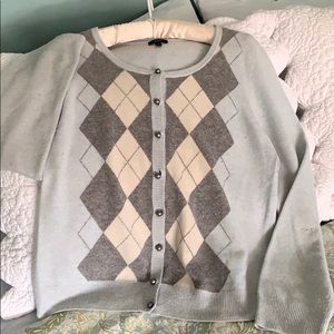 COPY - Argyle sweater with grey “pearl” buttons.